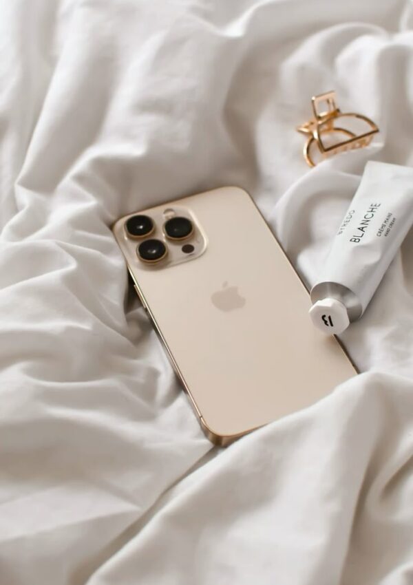 Canva mobile app on iPhone showing how to upload a custom font in Brand Kit settings with upload button highlighted